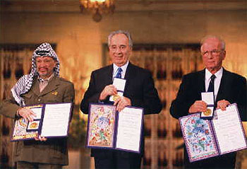 Chairman Y. Arafat and PM Itzhak Rabin after signing the Oslo Agreement, 1993